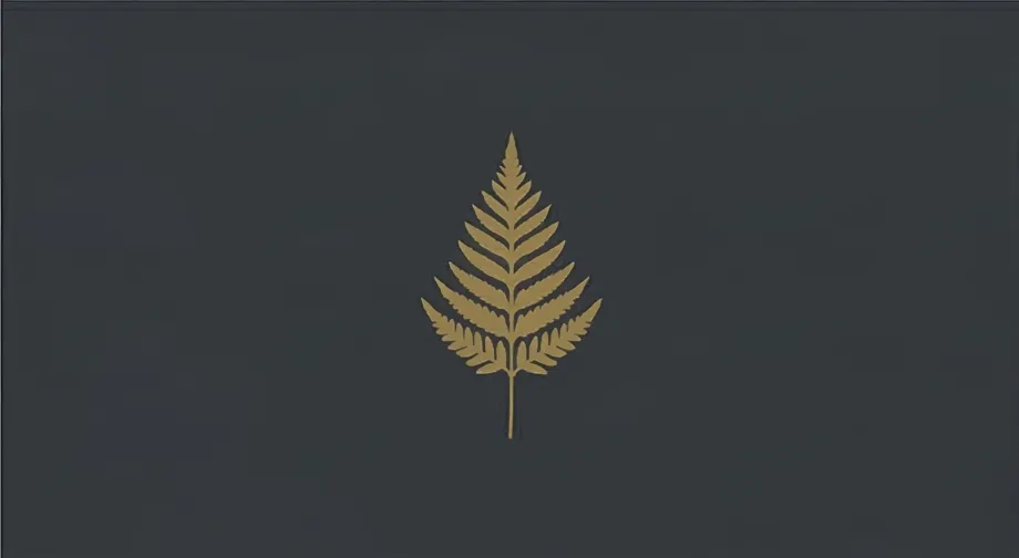 Gold fern motif centered on gray background