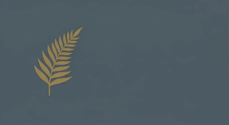 Gold fern motif on left with slate gray background